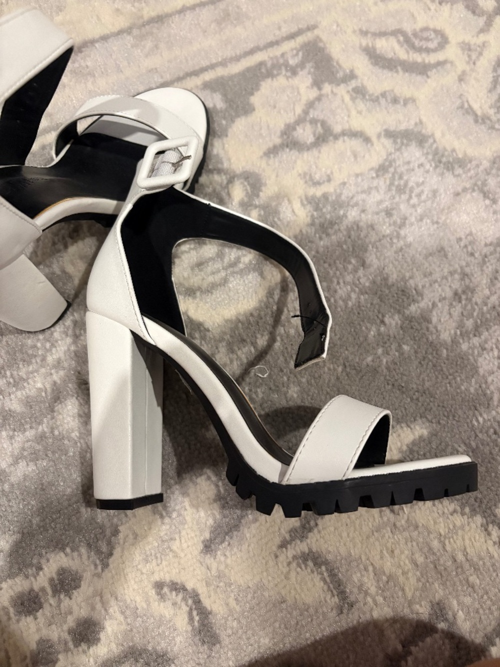 White and black heels